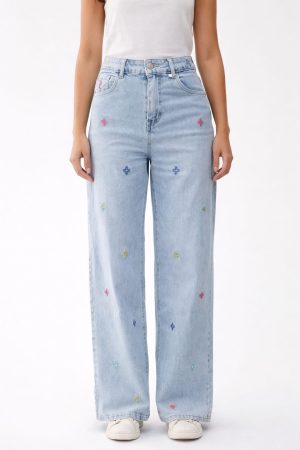 Vaquero flores bordadas