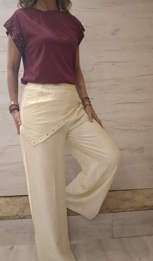 Pantalón amarillo pañuelo y tachas